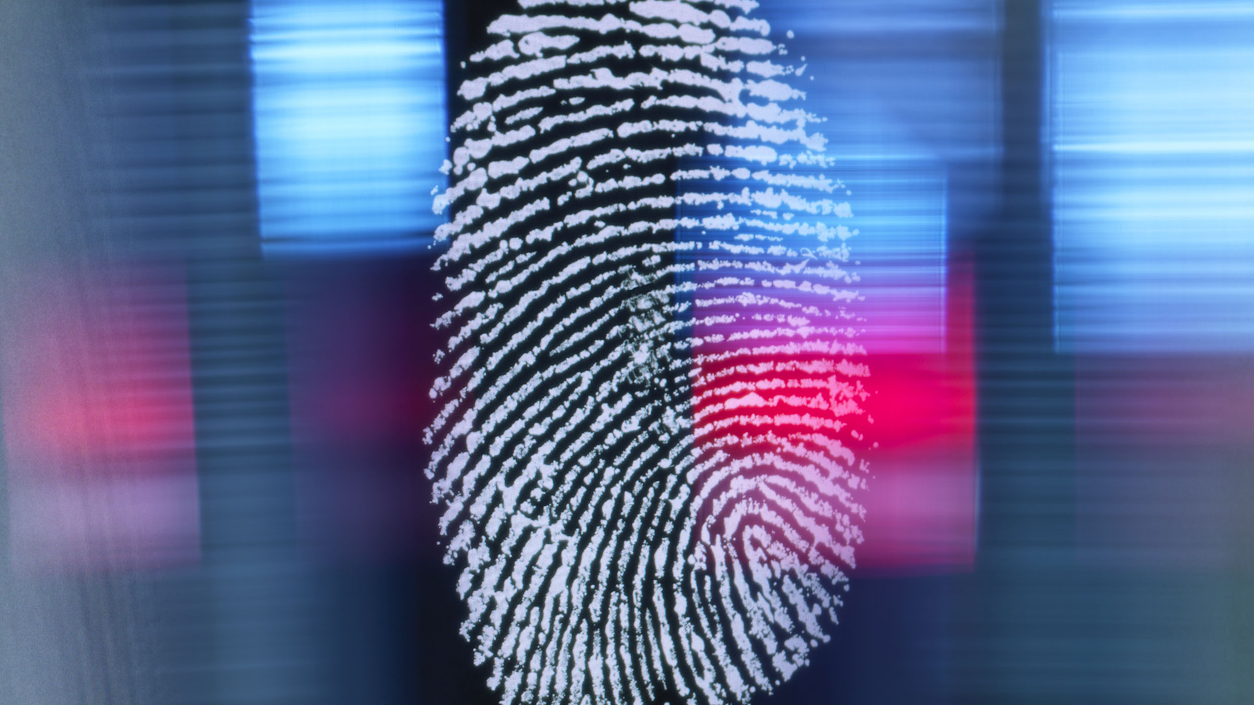 Close-up of a digital fingerprint scan representing online identity verification and secure authentication